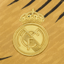 Maillot d'entraînement doré du Real Madrid 2025-2026